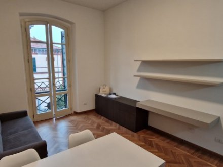 FURNISHED TWO-ROOM APARTMENTS WITH SERVICE AND CELLAR